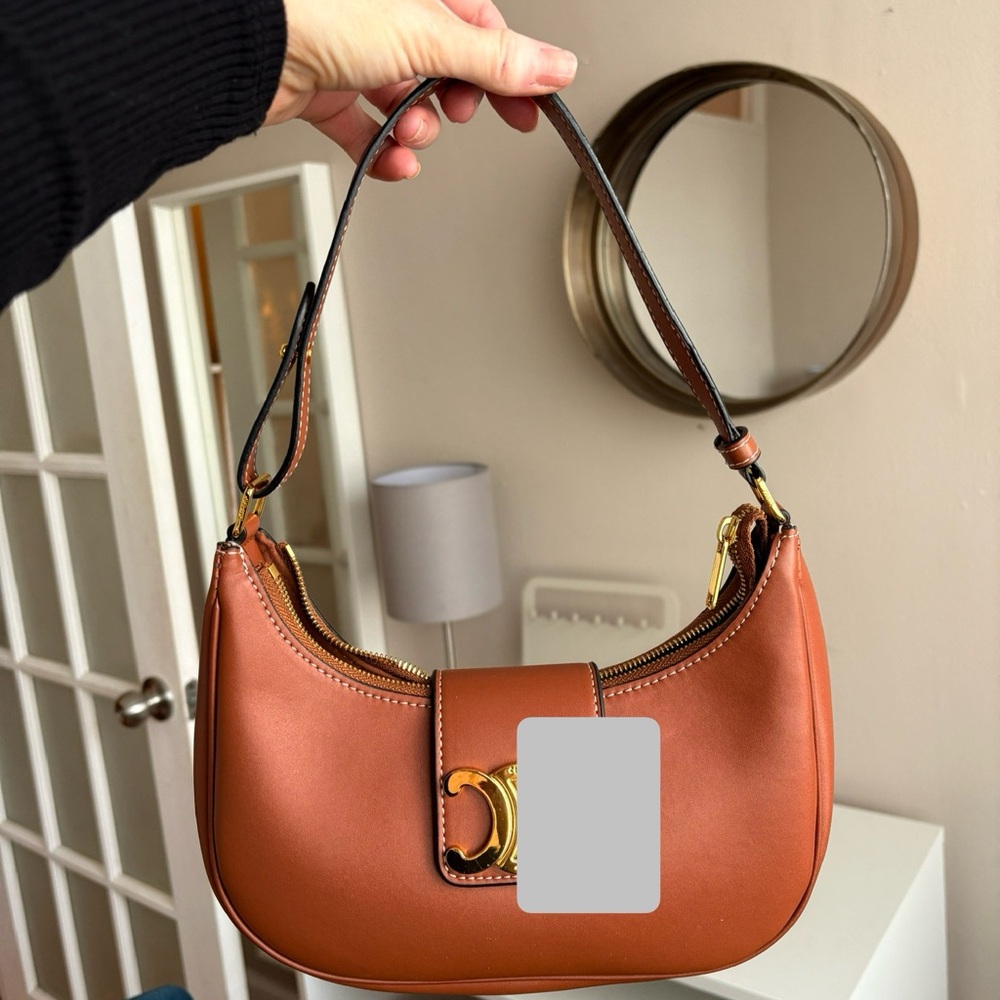 Chic Brown Leather Bag with Gold Accents